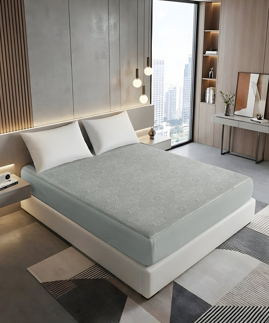 ultrasonic punched pattern mattress protector